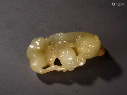 A YELLOW JADE MYTHICAL BEAST, 18TH CENTURY