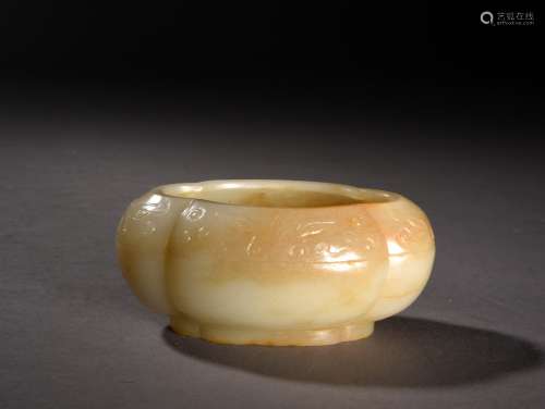 A CREAMY WHITE AND RUSSET JADE ARCHAISTIC FORM WASHER, 19TH CENTURY