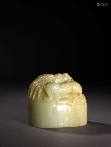 A PALE CELADON JADE DRAGON SEAL, 19TH CENTURY