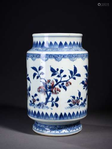 A BLUE AND WHITE AND COPPER RED DECORATED CYLINDRICAL VASE, 18TH CENTURY