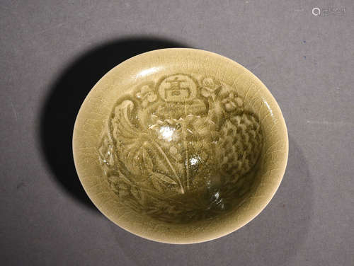 A YAOZHOU CUT-GLAZED BOWL, 16TH CENTURY