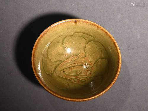 A YAOZHOU CUT-GLAZED BOWL, 16TH CENTURY