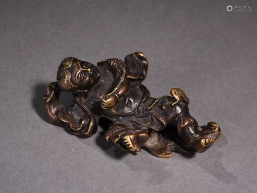 A BRONZE LIUHAI BRUSH REST, 19TH CENTURY