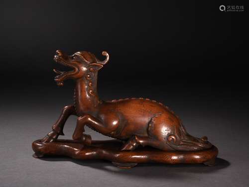 A CARVED WOODEN BEAST, 19TH CENTURY