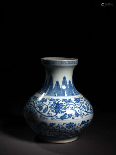 A BLUE AND WHITE LOTUS SCROLL ZUN VASE, 18TH CENTURY