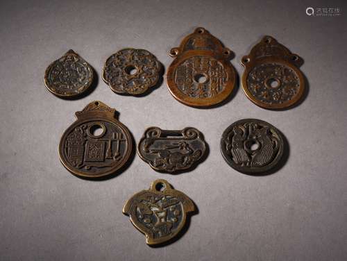 A GROUP OF BRONZE AMULETS, 19TH CENTURY