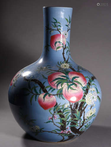 A BLUE GLAZED GROUND FAMILLE ROSE GLOBULAR VASE, 19TH CENTURY