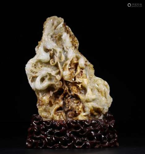 A CHINESE WHITE JADE SCHOLAR ROCK STATUE, QING DYNASTY