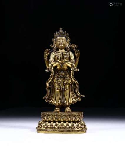 A CHINESE COPPER GILT FIGURE OF GUANYIN, MING DYNASTY