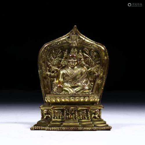 A CHINESE COPPER GILT FIGURE OF BUDDA, QING DYNASTY