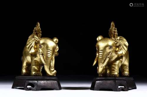 A PAIR OF CHINESE COPPER GILT FIGURE OF ELEPHANTS, QING