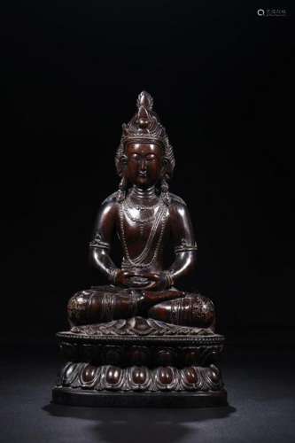 A CHINESE ROSEWOOD FIGURE OF GUANYIN, QING DYNASTY