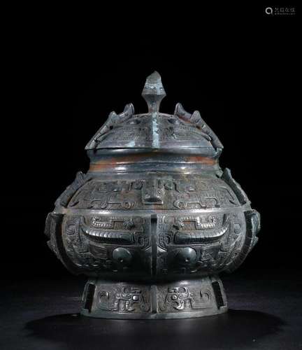 A CHINESE BRONZE CENSER WITH HEAD, QING DYNASTY.