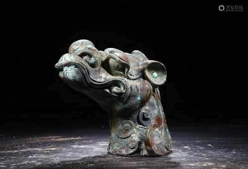 A CHINESE ARCHAIC BRONZE WITH TURQUOISE MYTHICAL BEAST