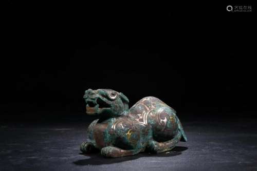 A CHINESE ARCHAIC BRONZE MYTHICAL BEAST STATUE, QING