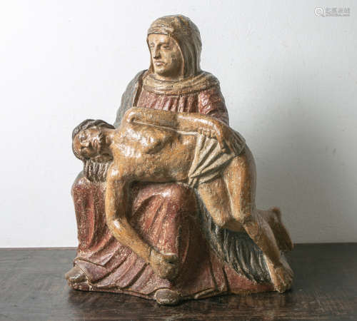 Spätgotische Pieta, geschnitzte Figurengruppe: Maria auf einer Felsenbank sitzend, denLeichnam