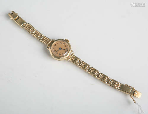 Damenarmbanduhr 585 GG (wohl 1930/40er Jahre), gelbes Zifferblatt m. arab. Minuterie inSchwarz,