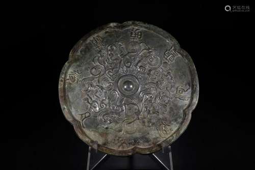 A CHINESE ARCHAIC BRONZE MIRROR, QING DYNASTY