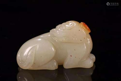 A CHINESE WHITE JADE MYTHICAL BEAST STATUE, QING