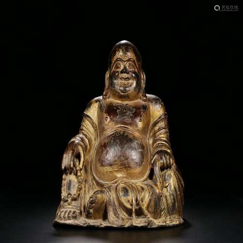 A CHINESE LACQUER GILT BUDDA, MING DYNASTY