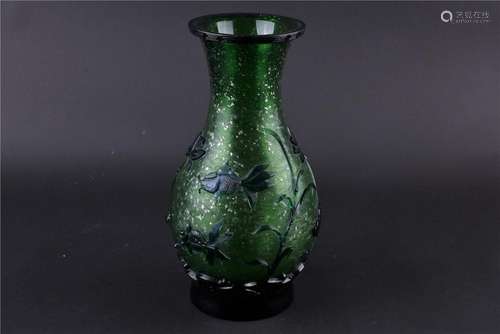 A CHINESE GREEN GLASS  LOTUS  CARVING VASE, LATER QING