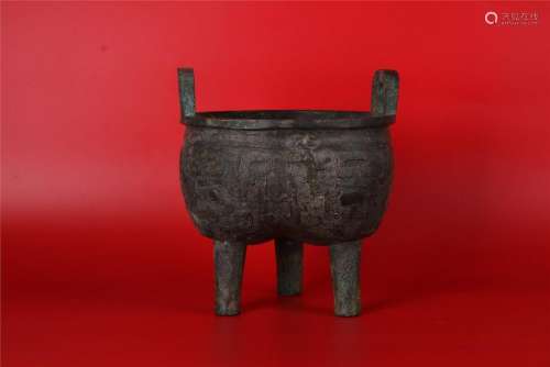A CHINESE ARCHAIC BRONZE RITUAL FOOD VESSEL(DING),