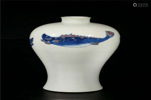 A CHINESE BLUE AND WHITE WITH UNDERGLAZED RED VASE,