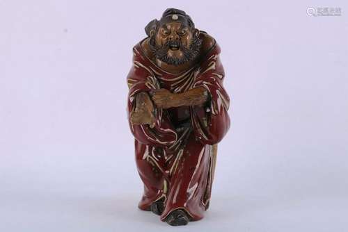 A CHINESE RED GLAZED FIGURE OF CHUNGKUI , REPUBLICAN