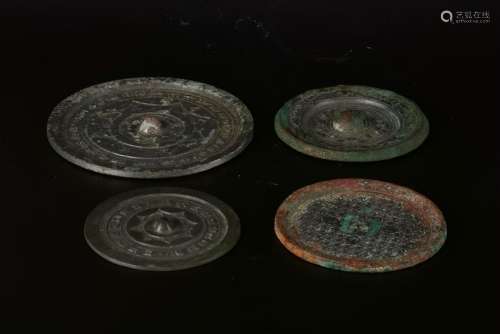 A SET OF FOUR CHINESE COPPER MIRRORS, HAN DYNASTY