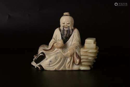 A CHINESE SOAPSTONE SCHOLAR STATUE, QING DYNASTY