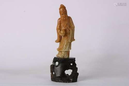 A CHINESE SOAPSTONE FIGURE OF LONGEVITY IMMORTAL, QING