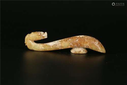 A CHINESE WHITE JADE BELT HOOK, MING DYNASTY