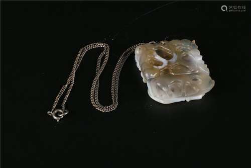 A CHINESE AGATE PENDENT, QIANLONG PERIOD, QING DYNASTY