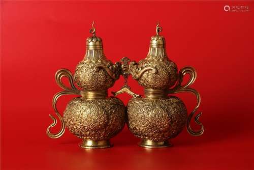 A CHINESE GILT-BRONZE DOUBLE-GOURD BOTTLE VASE,