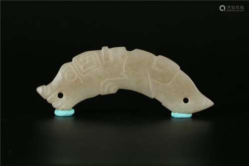 A CHINESE DOUBLE DRAGON HEADS-SHAPED FINE WHITE JADE
