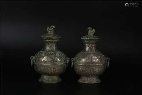 A PAIR OF CHINESE SLIVER VASE, WARRING STATES PERIOD