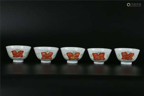 A SET OF FIVE CHINESE IRON-RED PORCELAIN CUPS, REPUBLIC