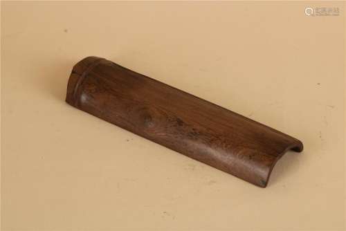 A CHINESE ROSEWOOD WRISTREST, MIDDLE QING DYNASTY