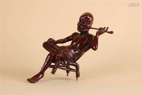 A CHINESE BOXWOOD FIGURE OF IMMORTAL, QING DYNASTY