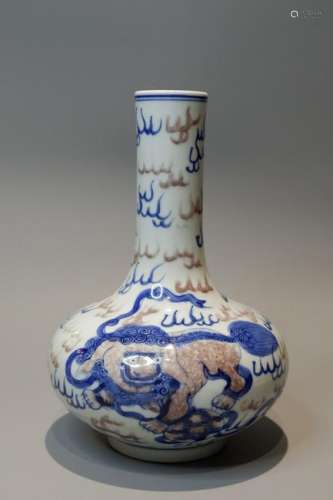 A CHINESE UNDERGLAZE RED VASE,QING DYNASTY