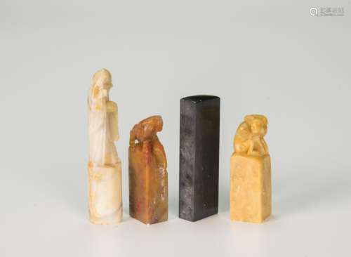 A Set of Four soapstone carved seal