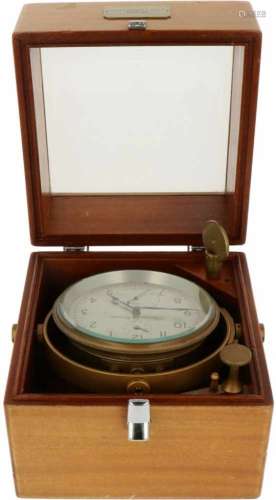 Een scheepschronometer. Adres: Thomas Mercer St. Albans, England. Een messing plaatje met de