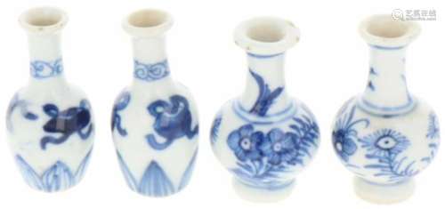 zurückgezogenA lot with four porcelain miniature vases. China, Kangxi. Rim damage. Dim. H: 5 cm.