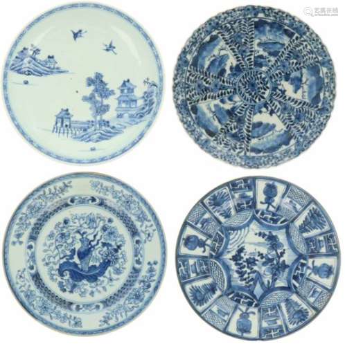 Een lot van vier porseleinen borden met diversen decoren w.o. bloemen en landschaps decor. China,