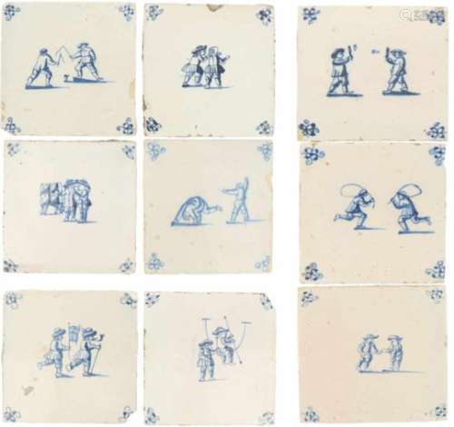 Een lot van negen aardewerk tegels met decor van kinderspelen. Holland 19e eeuw en later.A lot of