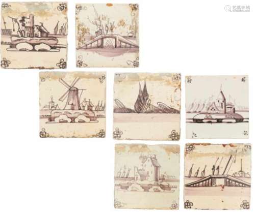 Een lot van zeven aardewerk tegels met landschap decor. Holland 19e eeuw.A lot of seven
