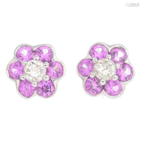 A pair of 18ct gold pink sapphire and diamond floral cluster earrings.Estimated total diamond