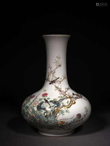 A FAMILLE ROSE MAGPIE AND PRUNUS BOTTLE VASE, 19TH CENTURY