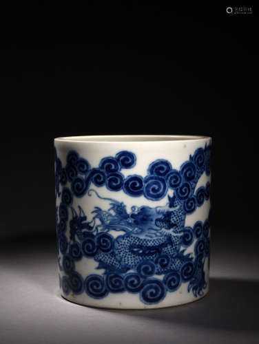 A BLUE AND WHITE DRAGON AND CLOUD BRUSHPOT, 18TH CENTURY