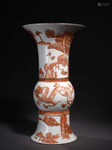 AN IRON-RED BEAKER VASE, QIANLONG SIX CHARACTERS SEAL MARK AND OF THE PERIOD